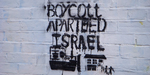 Graffiti denouncing the apartheid system of Israel's government against Palestinians.