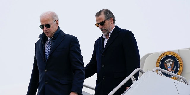 President Biden and his son, Hunter Biden, step off Air Force One, Saturday, Feb. 4, 2023, at Hancock Field Air National Guard Base in Syracuse, N.Y. 