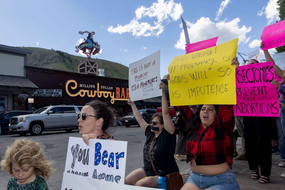 PHOTO: In this June 24, 2022, file photo, abortion rights protesters chant slogans during a gathering to protest the Supreme Court's decision in the Dobbs v Jackson Women's Health case, in Jackson Hole, Wyoming.