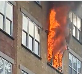 Firefighters tackle blaze in flats near St Bart's