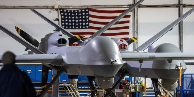 An MQ-9 Reaper drone with Customs and Border Protection (CBP) awaits the next mission over the U.S.-Mexico border on Nov. 4, 2022 at Fort Huachuca, Arizona.  