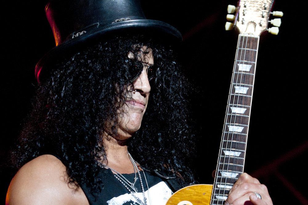 Slash's go-to guitar is the Les Paul after seeing Jimmy Page and Eric Clapton playing the guitar