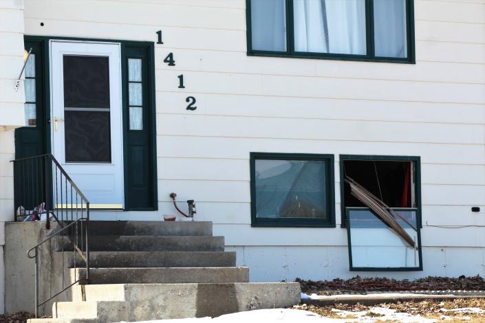 A broken lower story window marks the location of Friday's fatal shooting, the second within 36-hours in Great Falls