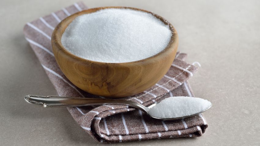 Healthy sugar substitute erythritol on a gray background