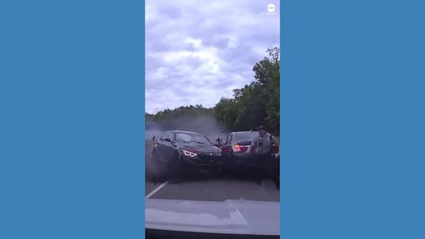 Video Officer nearly crushed by out-of-control car