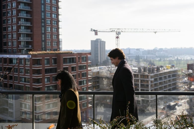 Prime Minister Justin Trudeau and Deputy Mayor of Ajax Marilyn Crawford arrive for a housing announcement