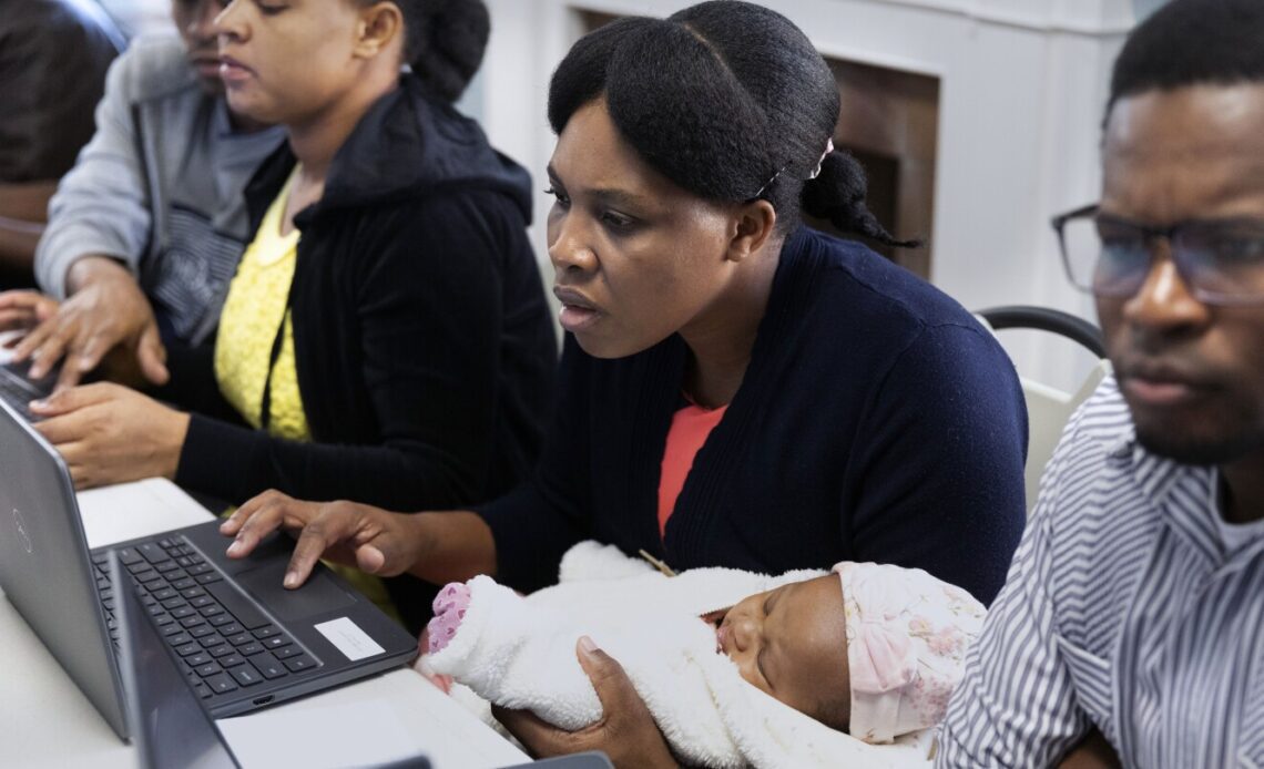 At a church rectory in Boston, Haitian migrants place their hopes on hard work and helping hands