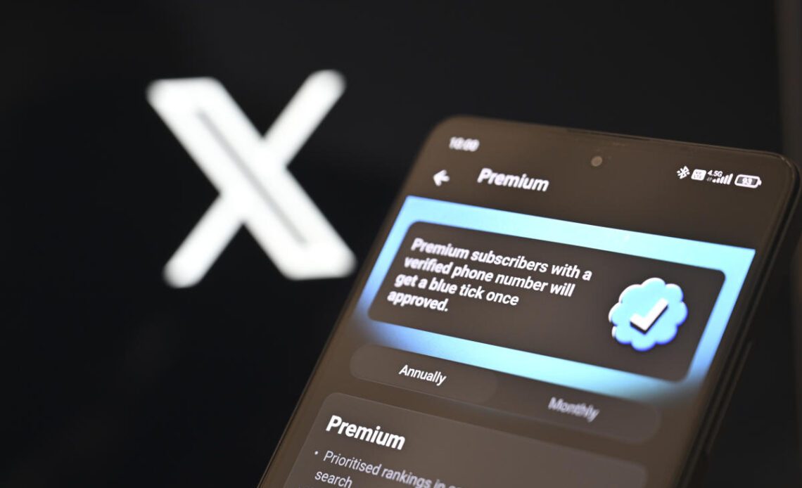 X let terrorist groups pay for verification, report says