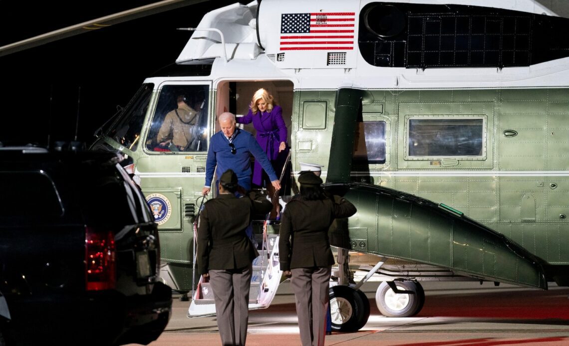 Biden signs a package of spending bills passed by Congress just hours before a shutdown deadline