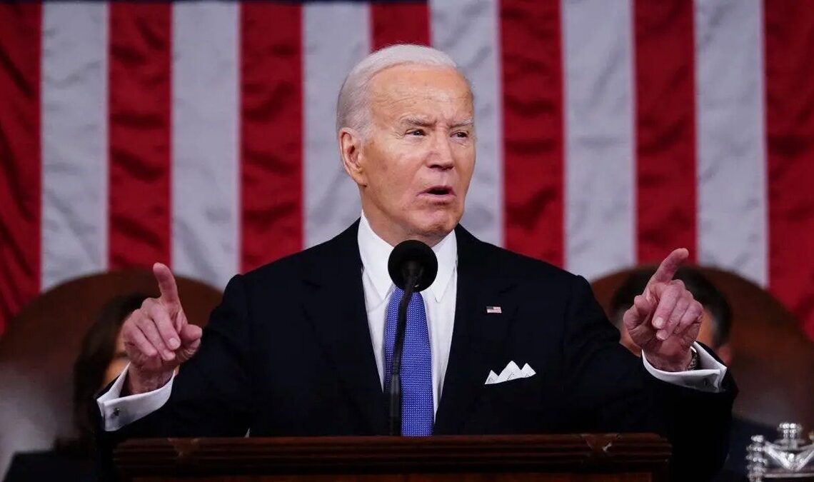 US President Joe Biden speaking at the State of the Union in House chamber.