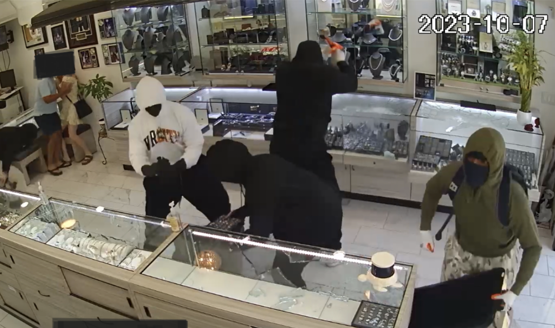 Smash and grab robbers in jewelry store