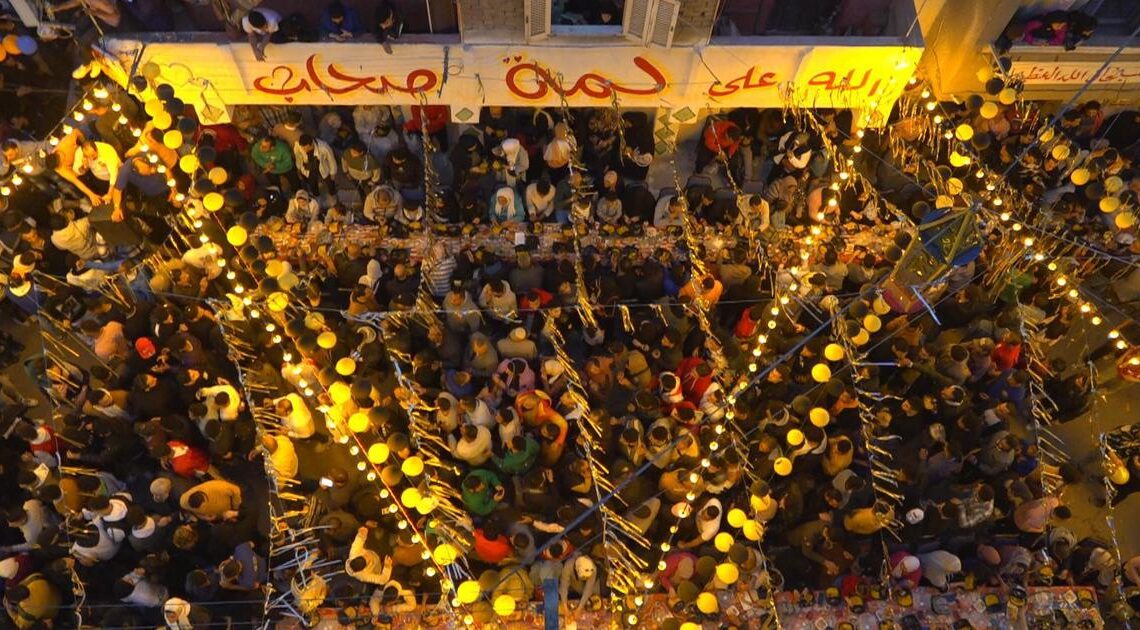 Thousands pack narrow alleys in Cairo for Egypt's mega-Iftar