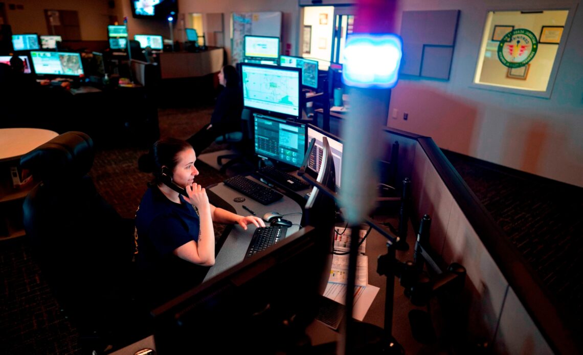 PHOTO: A dispatcher with Anne Arundel County Fire Department  answers a 911 emergency call from their department dispatch center, April 14, 2020, in Glen Burnie, Md.