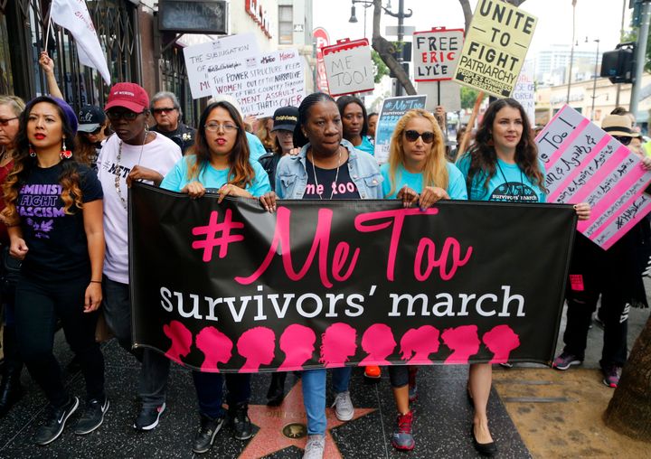 Tarana Burke, founder and leader of the #MeToo movement, marches center with others at the 2017 #MeToo March in the Hollywood section of Los Angeles.