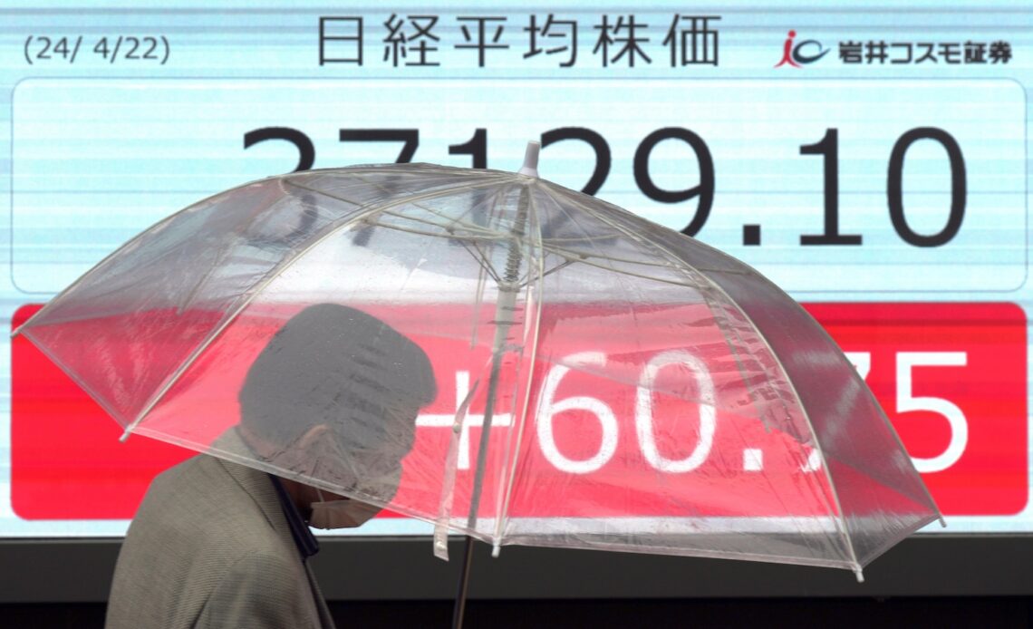 Stock market today: Asian shares shrug off Wall St blues as China leaves lending rate unchanged