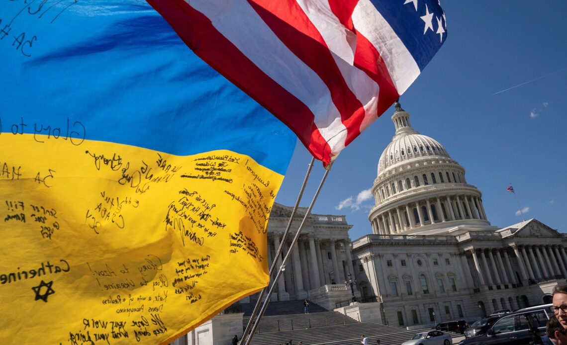 US lawmakers rebuked for waving Ukraine flags as aid bill is passed | Russia-Ukraine war