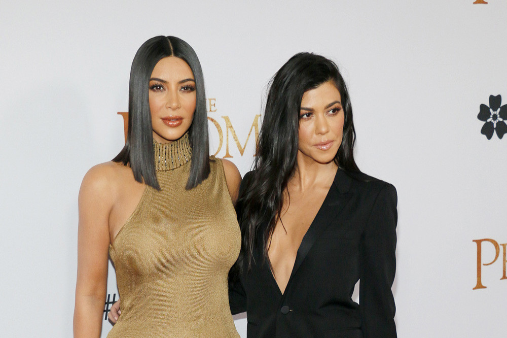 Kourtney Kardashian and Kim Kardashian insist the are on really good terms