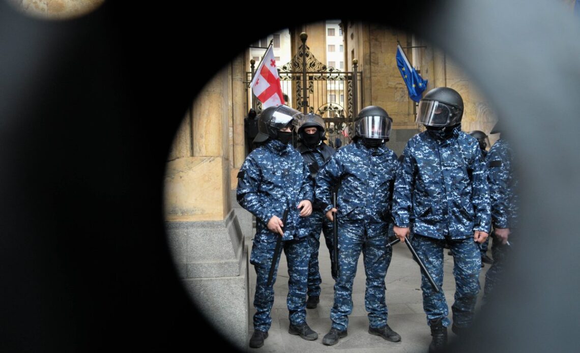 Georgian police pictured in parliament May 2024