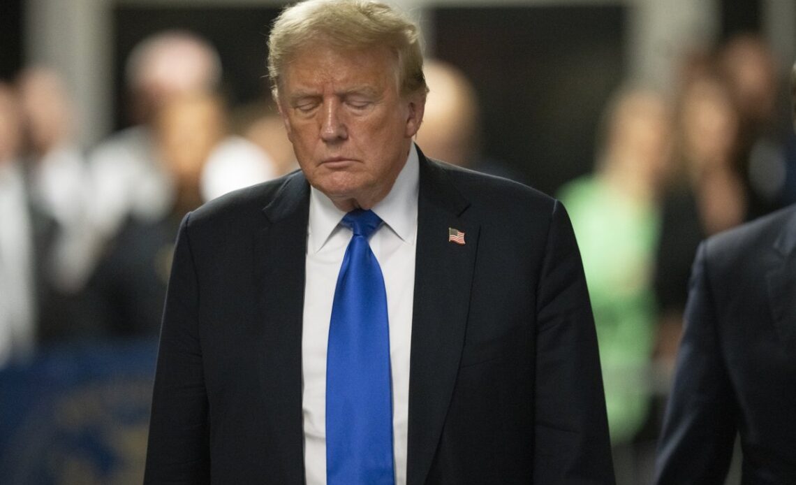 Donald Trump appears outside a courthouse