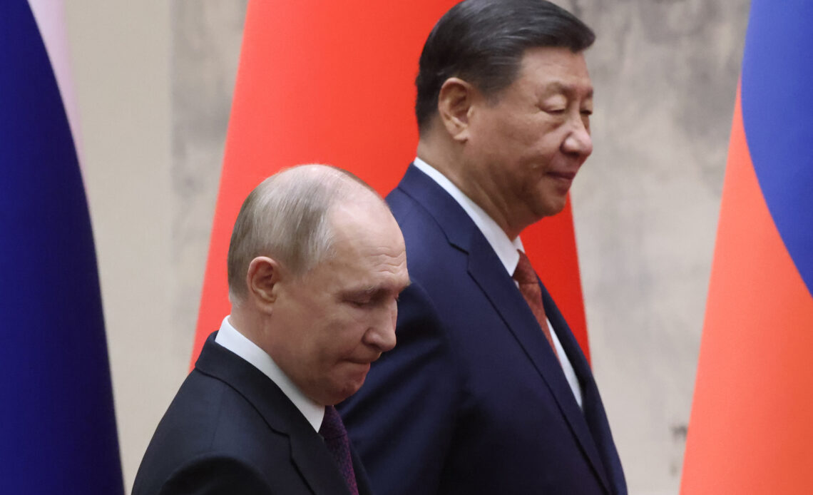 Vladimir Putin and Xi Jinping