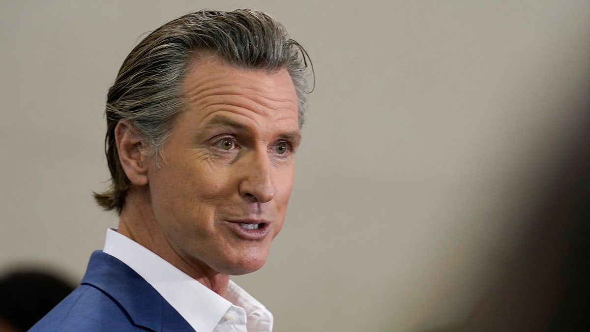 Newsom smirks at news conference in Sacramento