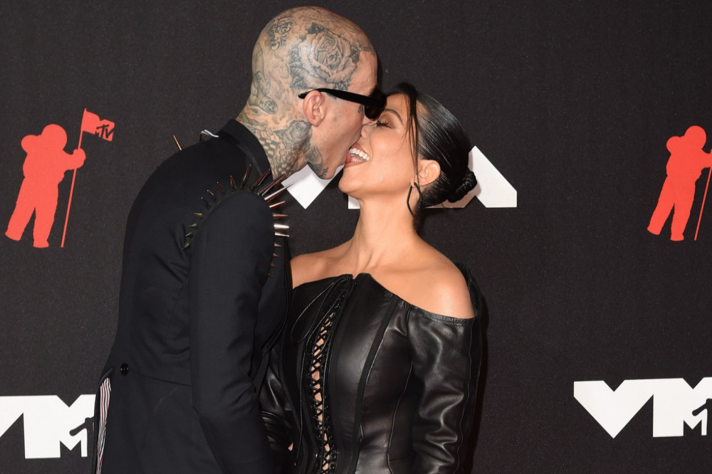 Kourtney Kardashian and Travis Barker were gym buddies first