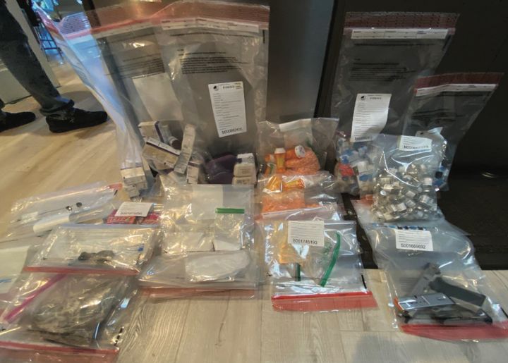 A photo from the indictment shows thousands of dollars worth of alleged drugs found in the home of Jasveen Sangha.