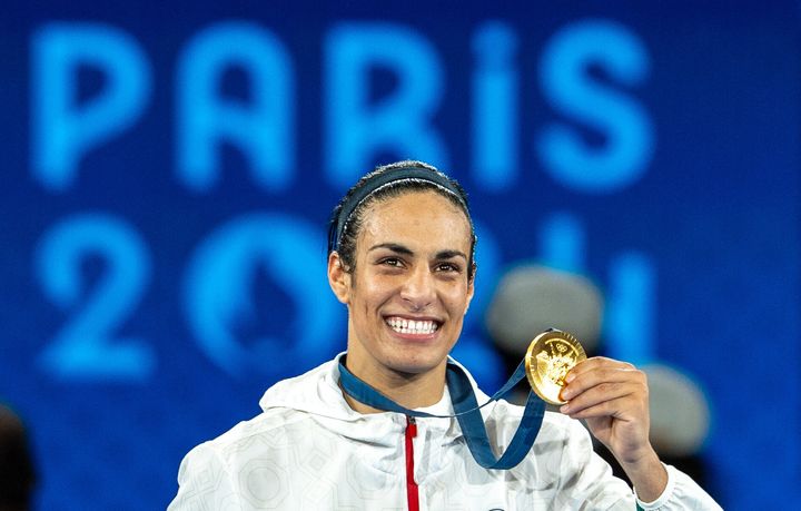 Imane Khelif celebrates her gold medal in the 66-kilogram division.