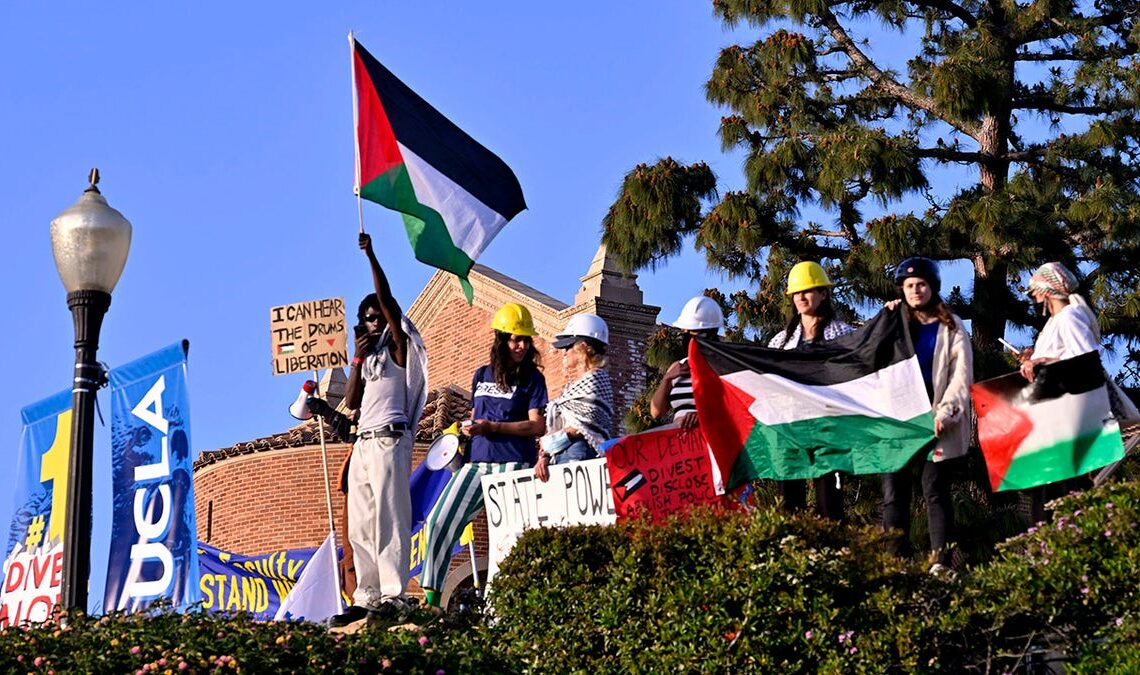 Protesters at UCLA wave Palestinian flag