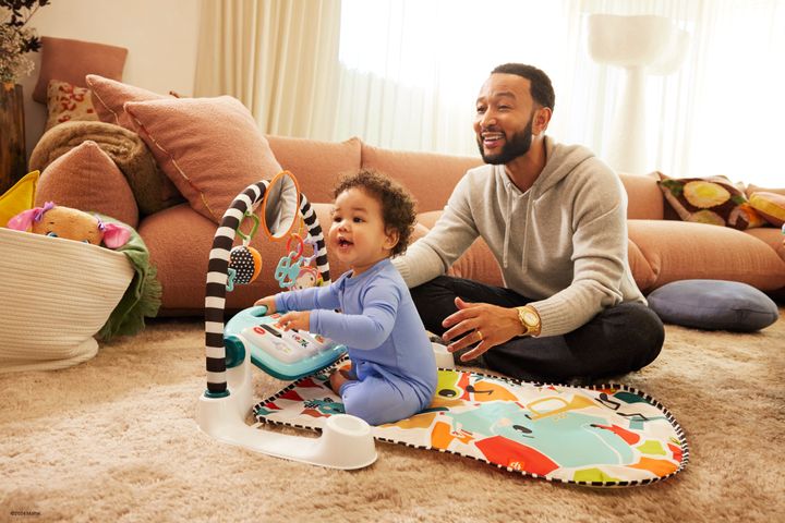 John Legend playing with his 1-year-old son, Wren Alexander Stephens, at their family home.