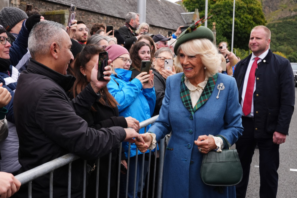 Queen Camilla wore the Diamond Thistle Brooch from Queen Elizabeth’s jewellery collection as she joined King Charles at Scottish Parliament’s 25th  anniversary