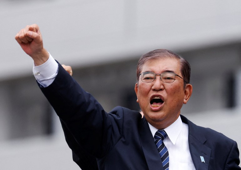 Japan's Prime Minister Shigeru Ishiba, leader of the Liberal Democratic Party, gestures during a campaign event for the upcoming general election in Tokyo, Japan