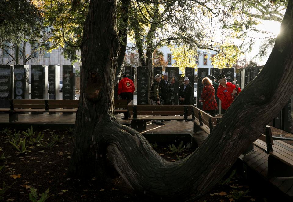 The Vietnam War Memorial at the corner of Cottage and State Streets is unveiled and dedicated during a ceremony at the Oregon State Capitol grounds on Friday, Nov. 22, 2024 in Salem, Ore.