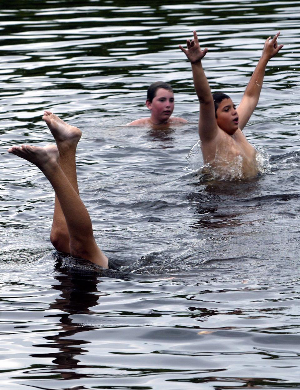 Hobe Sound-Boy Scouts of Tanah Keeta Summer Camp enjoy the new Loxahatchee River swimming area at Jonathan Dickinson State Park after a ribbon cutting ceremony in November 2011.