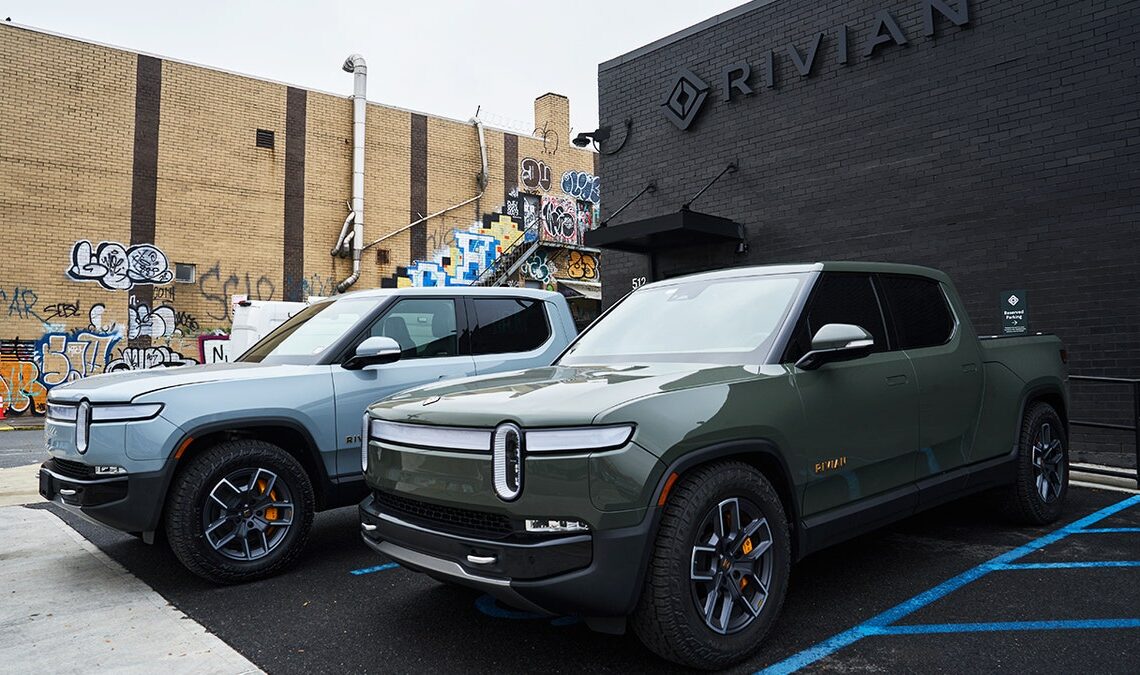 Rivian R1T electric pickup trucks parked at a Rivian service center in the Brooklyn borough of New York on Monday, Oct. 30, 2023. 