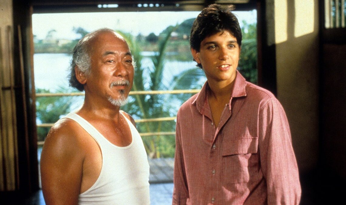 Pat Morita and Ralph Macchio in a scene from The Karate Kid