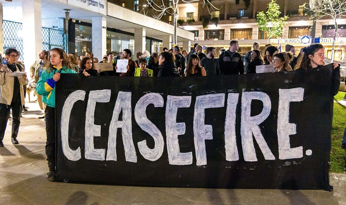 A group of protesters with signs