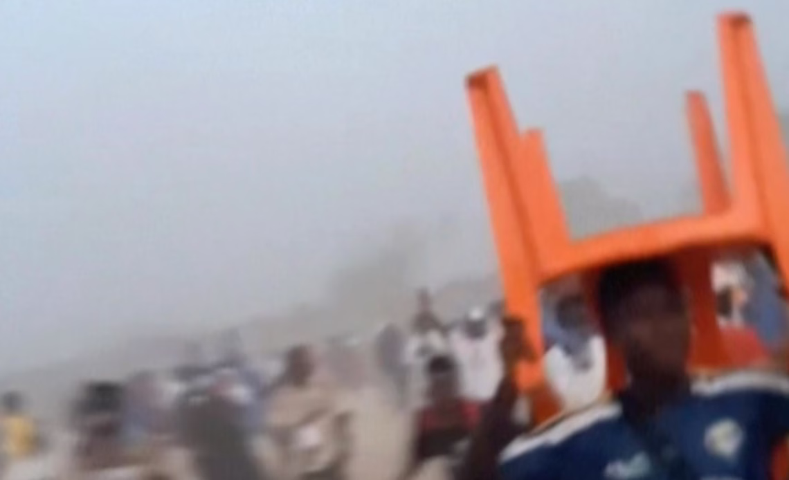 Relatives hunt for the missing after Guinea stadium crush amid fears official death toll is too low