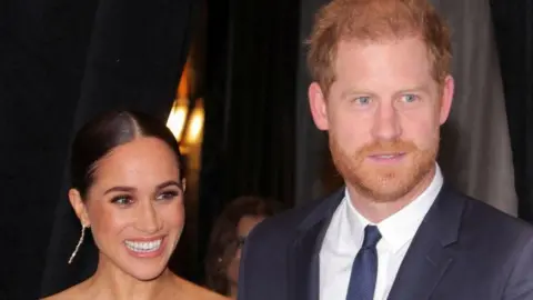 Reuters A close up pic of Meghan and Harry