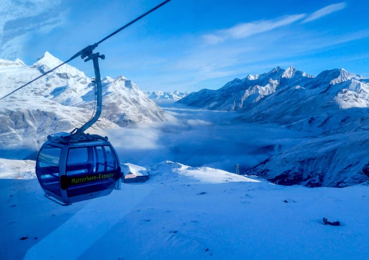An empty gondola goes up in Zermatt, Switzerland.