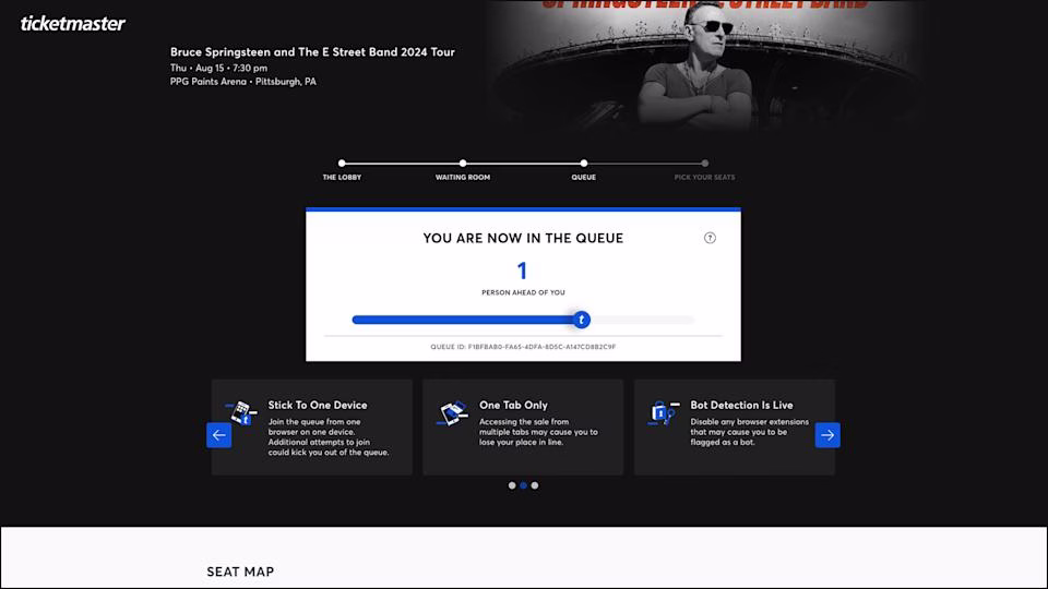 Screen showing a waiting queue for Bruce Springsteen tickets. It says one person is ahead of you.