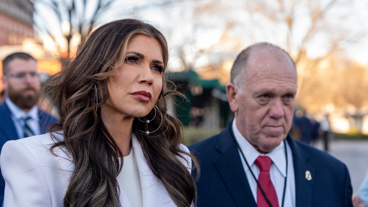 Kristi Noem and Tom Homan speak with reporters