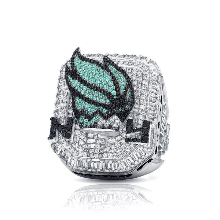 The New York Liberty's WNBA championship rings feature the team's torch logo — between the letters "N" and Y" — in its seafoam green and black colors. The Liberty, one of the league's original eight franchises, won their first championship back in October.