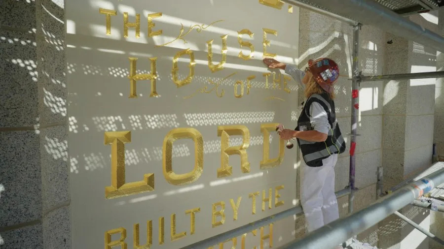 Anne Domenech works to restore the “Holiness to the Lord” panel, courtesy Church of Jesus Christ of Latter-day Saints