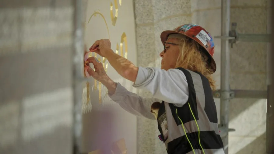 Anne Domenech works to restore the “Holiness to the Lord” panel, courtesy Church of Jesus Christ of Latter-day Saints