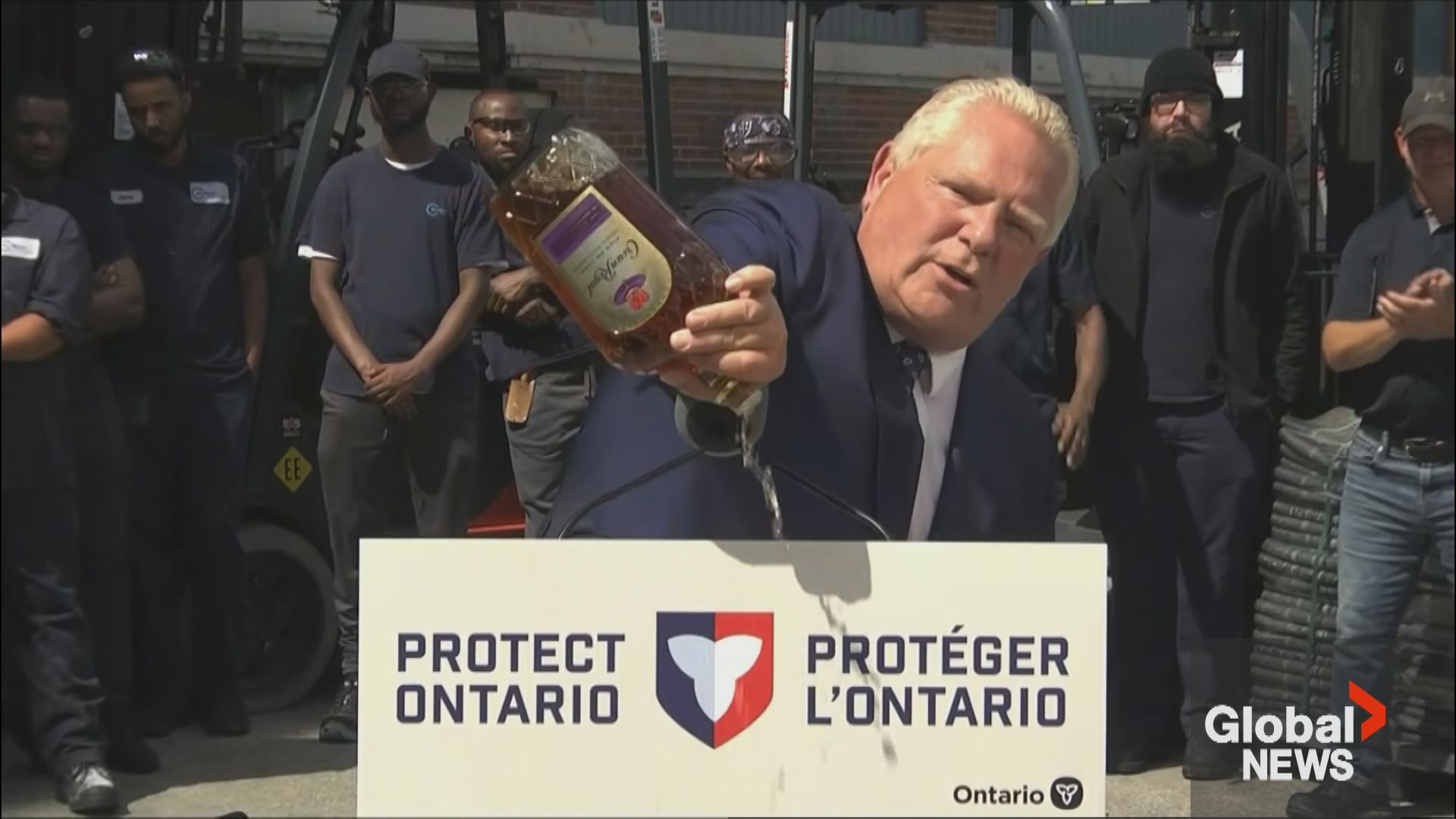 Click to play video: '‘Pouring one out’: Ford dumps out bottle of Crown Royal in response to Ontario plant closure'